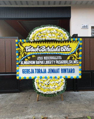 Papan Bunga Duka di Pasirpanjang